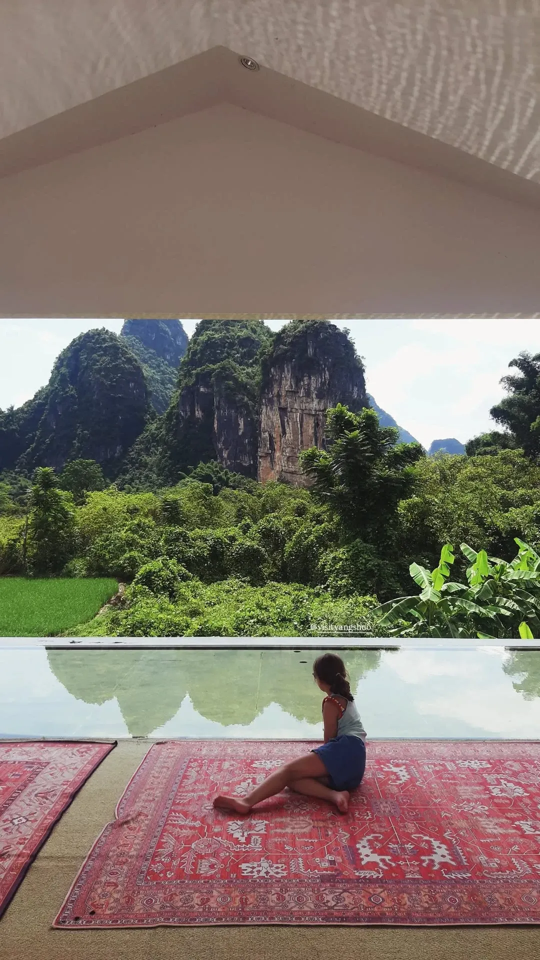 Reflection pool with karst mountain view at a Yangshuo resort